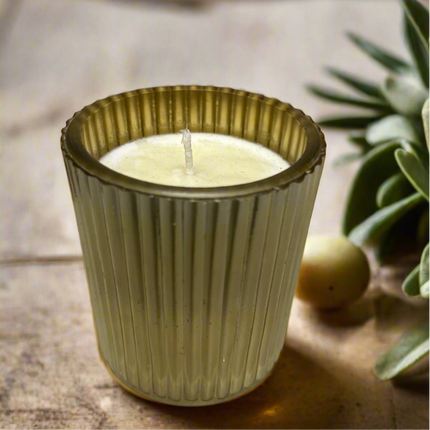 Scented candle in a lined cup